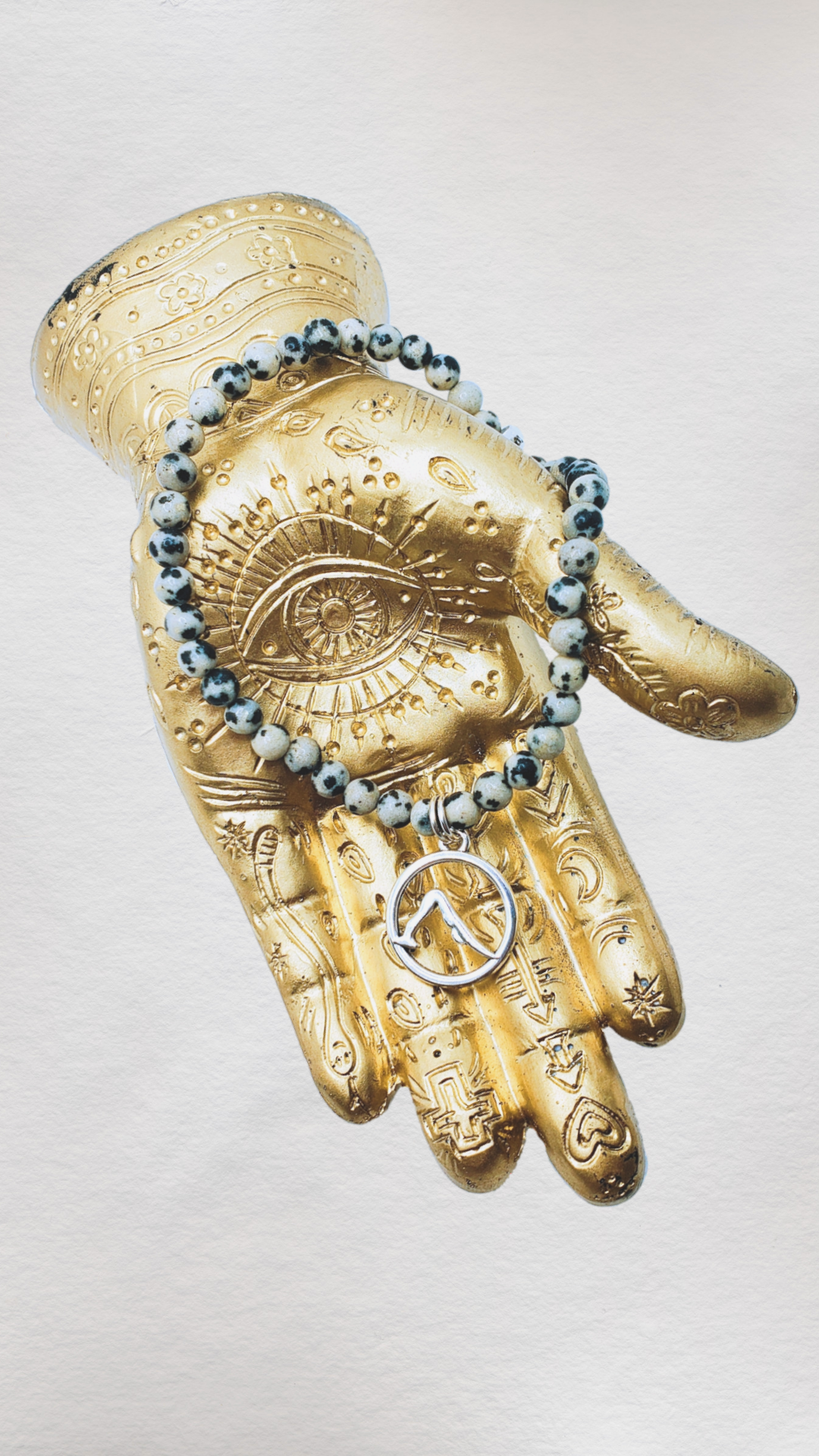 Embrace positivity + go with the flow of the universe with this Dalmatian Jasper bracelet.